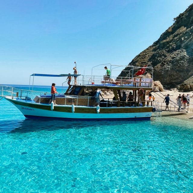 Suluada island boat trip with white sand beach and turquoise water from Adrasan