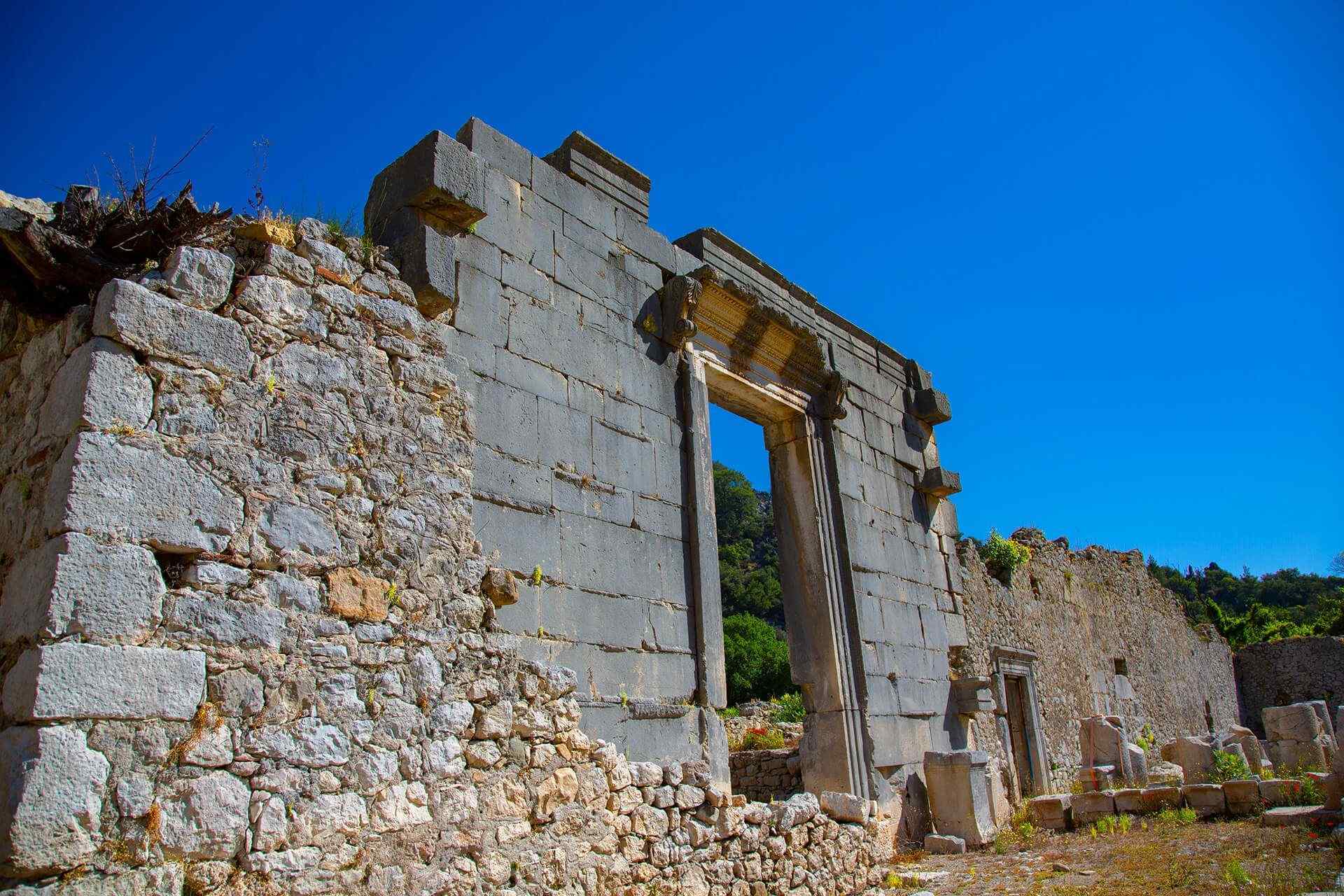 Olympos ancient city roman temple gate and historical stone structures